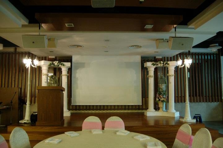 conferance stage with floral decor