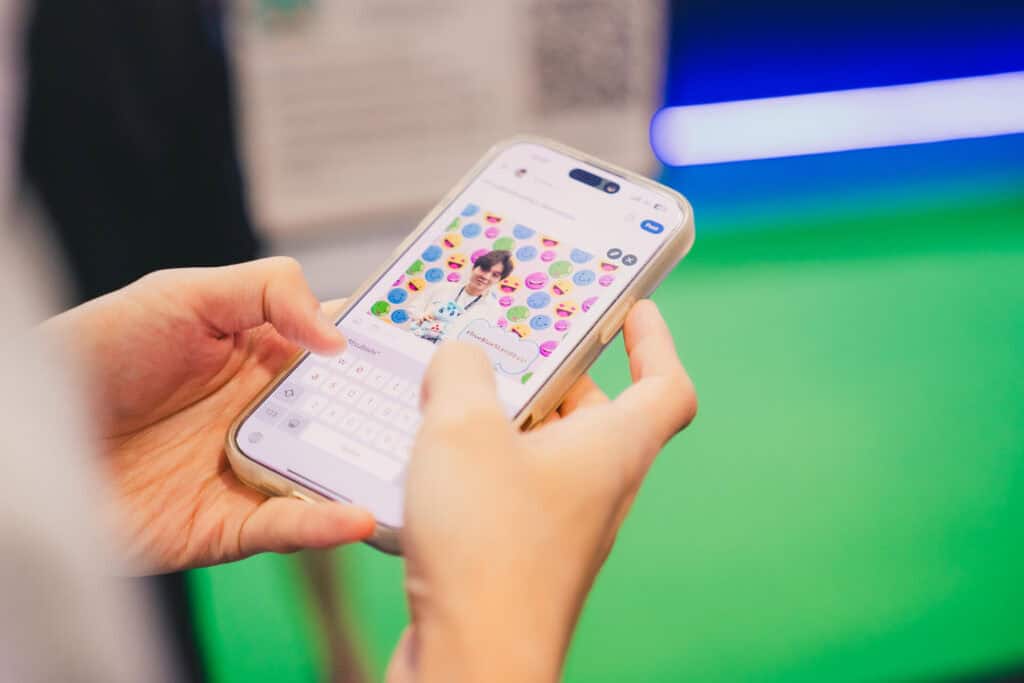 A person posting a photo from the Mitsubishi Heavy Industries photobooth on social media